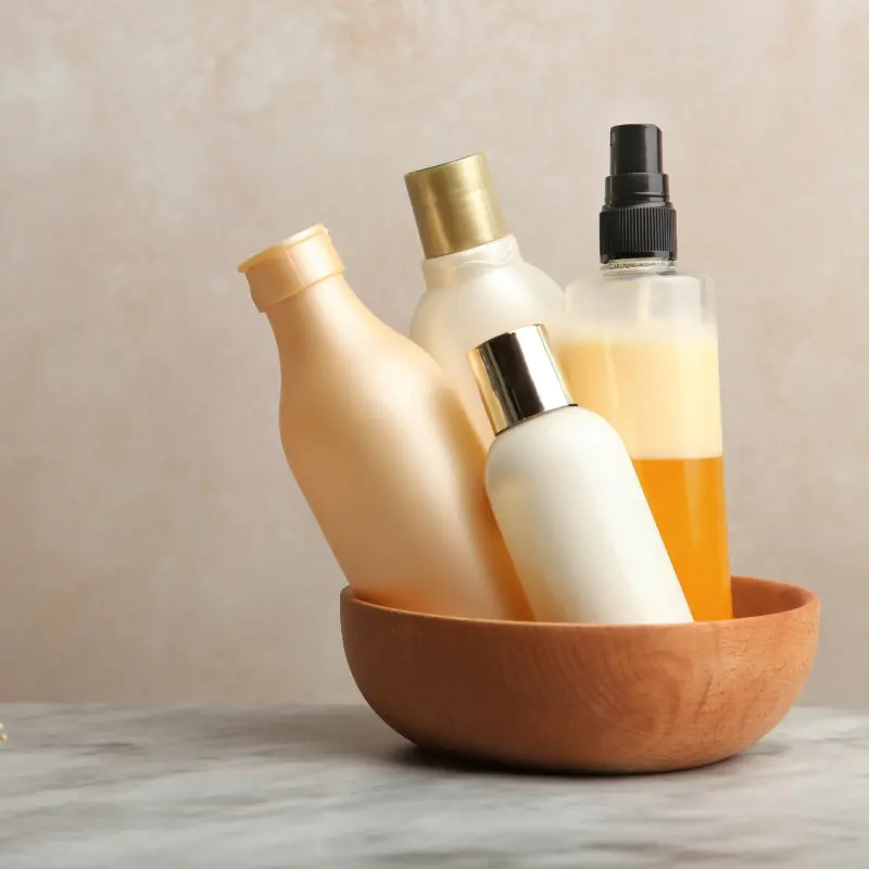 Skincare and personal care products arranged in a bowl representing CheapMed product range
